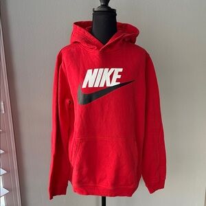 Nike Red Hoodie Sweater with swoosh symbol.